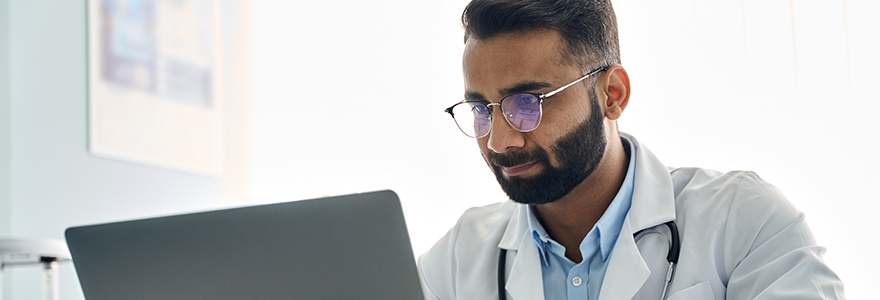 physician at computer